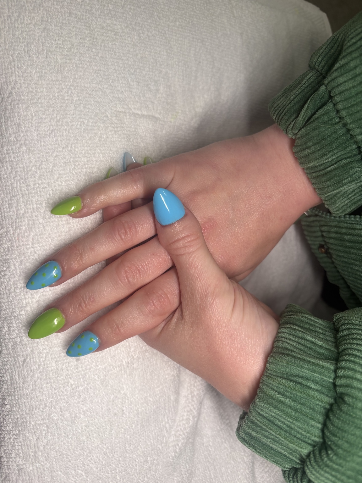 Carla’s blue and green almond nail set, a Basic Baddie portfolio example