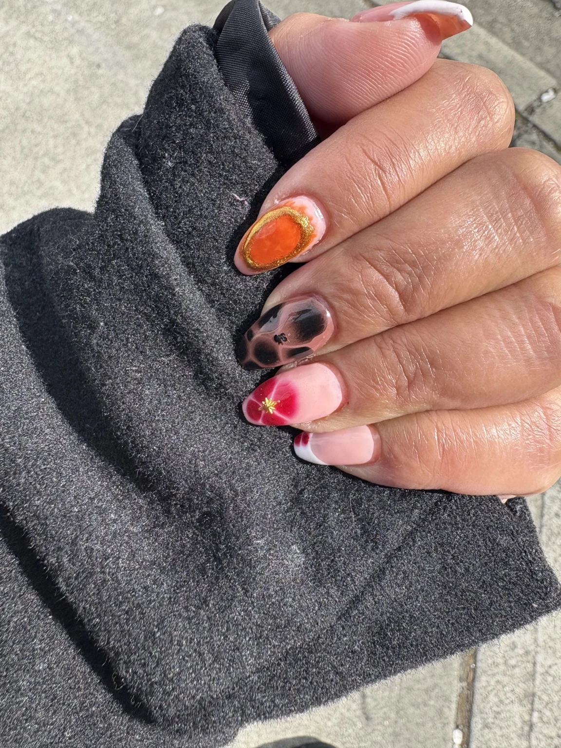 Carlita’s original nail work: mixed pink + orange art
