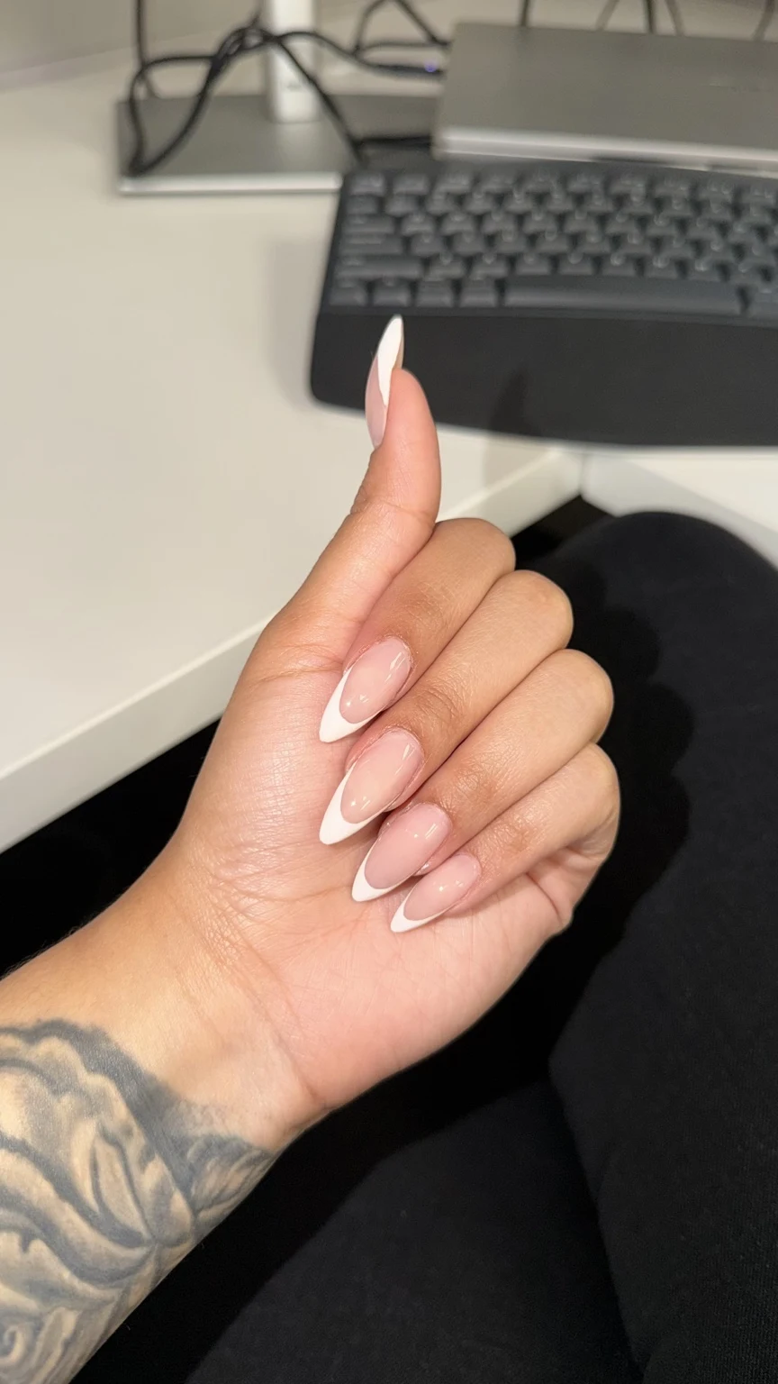 Carlita’s original nail work: classic white french
